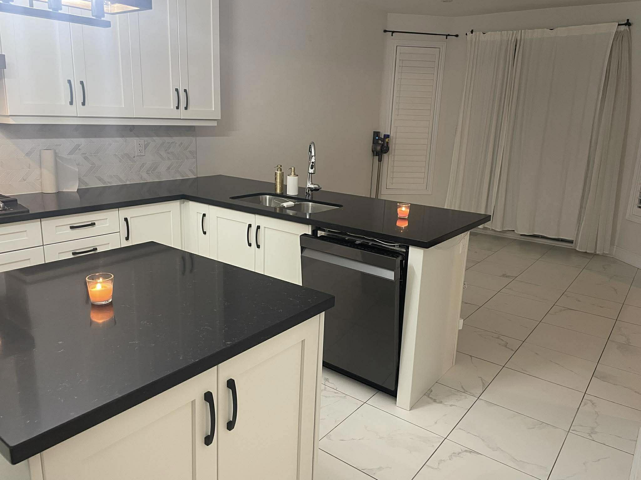 Clean kitchen with sparkling countertops