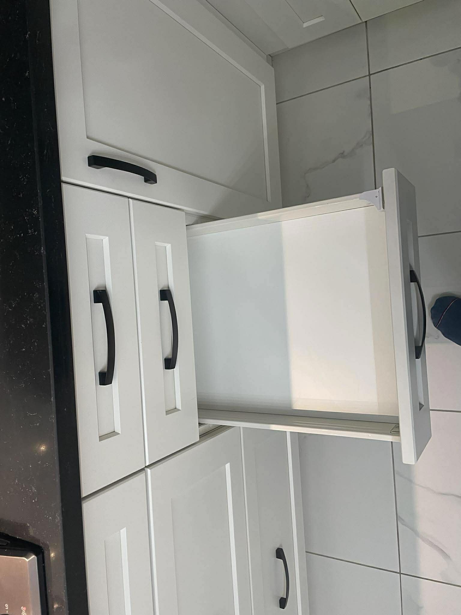 Clean empty cabinets ready for move-out inspection
